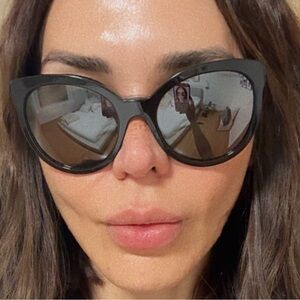 CHANEL Black Round Women's Sunglasses with Dark Lenses